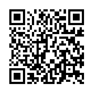 在摄像机前并没有表现出任何的失态表情二维码生成