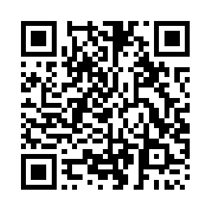 在案桌前拉住准备走回位置坐的夭华二维码生成