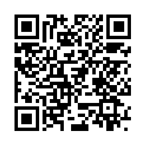 在水潭的旁边还有一座十米高的巨石二维码生成