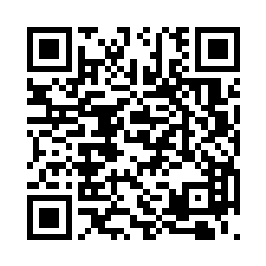 在看到光头少年在受伤的族人面前蹲下时二维码生成
