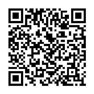 地委组织部衅走到背负双手吸着烟的史春林旁边二维码生成