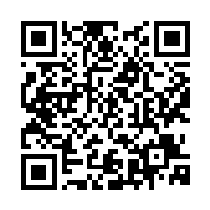 坐在这个布置得喜气洋洋的新房里二维码生成