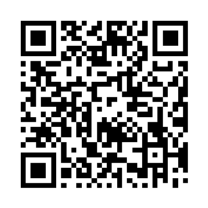 坛的袁炜看了下不远处登上小法坛的朱平安二维码生成