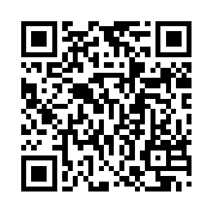 堆积的顶方压着一只空洞吓人的狰狞龙头二维码生成