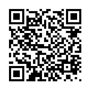 墙的主人却是一名长着富贵相的商人二维码生成