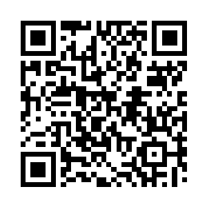 夏琪小姐正老老实实的坐在自己的位子上二维码生成