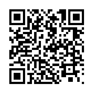 多鲁因将一张勋章似的东西交给雷林二维码生成