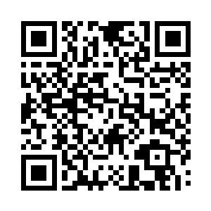 大腿上被子弹击中的穿透伤还在流血不止二维码生成