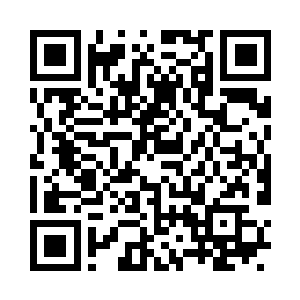 头顶光秃秃地在殿堂内口诵佛号的情景二维码生成