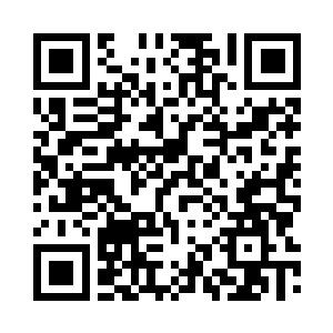 她家的廊前屋后已经挂了很多香肠了二维码生成