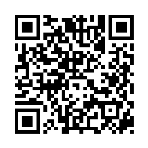 她的脸上露出了家庭主妇般的满足感二维码生成