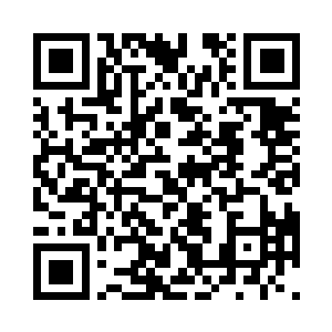 如牛头般的大脑袋上顶着一对粗壮弯角二维码生成