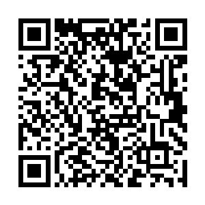 姜森在杀手们的身上发现了镰刀与十字架的纹身图案二维码生成