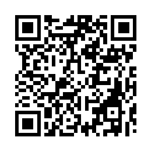 守城将领正一脸悠闲的坐在城楼里看着书籍二维码生成