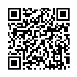 宋文杰从包里拿出一张破旧的照片二维码生成