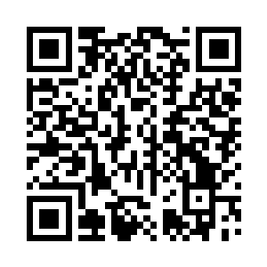 对着正在打开盒子的萨姆诺维奇做了个手势二维码生成