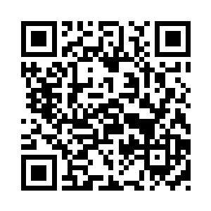 对讲机里传出东城区办案民警的报告声二维码生成