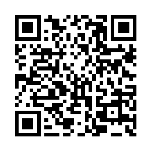 将整栋建筑都染上了细碎的蓝紫色光弧二维码生成