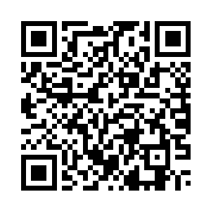 小杰踉跄着来到了赵纯良的店门口二维码生成