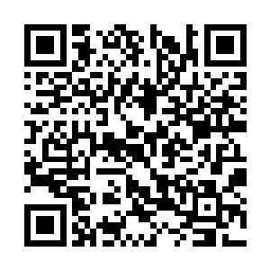 小的躲在一个闲置的酒楼上撒出了一万余块玉花石二维码生成