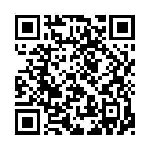 尖锐的獠牙从被人割掉的嘴唇缝隙中露出来二维码生成