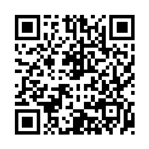 就在一张清代的黄花梨架墩写字台上二维码生成