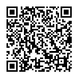 就离开看起来略微气派点的街面走进一片破旧小屋紧密靠在一起的平房里二维码生成