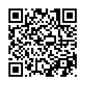 山洞里男人们脸上都带着孤注一掷的狠二维码生成