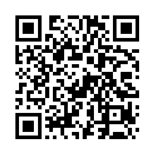 山脚下是一片片五颜六色的果园和农田二维码生成