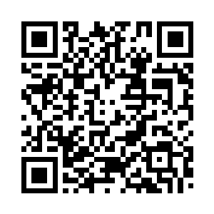 左肩之上已经被并排钻出两个枪眼二维码生成