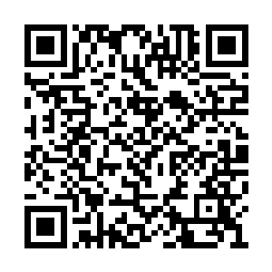 巨人族相传下来的兽神形象刻在器皿或者石头上二维码生成