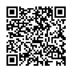 巴克摸出兜里的卫星电话量子电话之类跟步话机放进防水袋里二维码生成