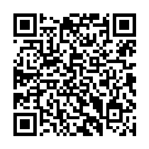 市委办公室主任曹继东和市委秘书长姬文锦走了进来二维码生成