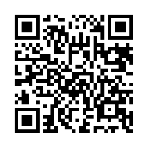 平原上覆盖着大约到膝盖高的翠绿野草二维码生成