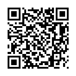 庞金华重新在赌桌上坐了下来……二维码生成