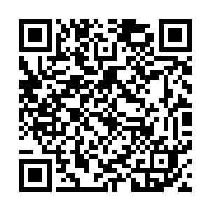 康斯坦丁腰间一个摇晃的手雷在图腾之光下显得那么不起眼二维码生成