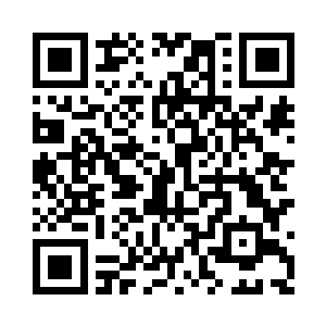 开始翻阅起咖啡屋柜台上摆放着的报纸起来二维码生成