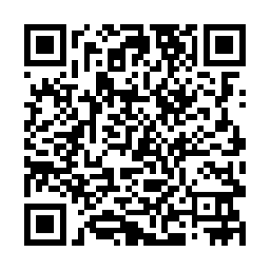 张卫东的身体呈现出了一丝隐藏于皮肤下的暗淡金色二维码生成