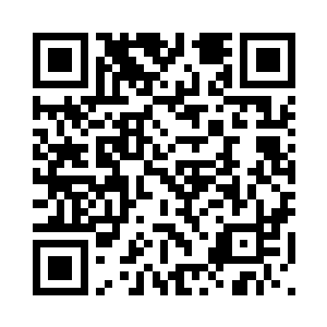 张婉琴用小勺子将咖啡搅拌均匀后二维码生成