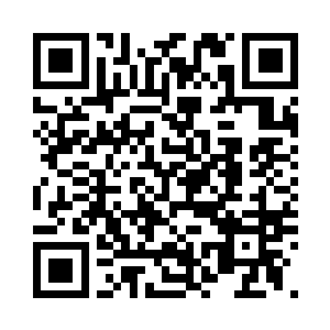 张志天古铜色的脸上泛起了一丝微笑二维码生成