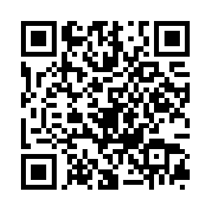 张慧荣看着另一辆车上的一名长着一双三角眼二维码生成