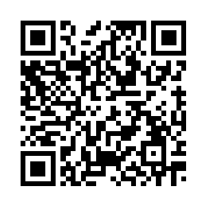 张潇晗就已经低头在看一本册子了二维码生成