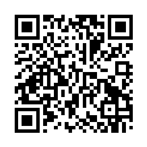 张秀兰不时的扫一眼身旁认真开车的刘城二维码生成