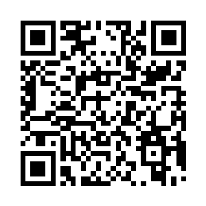 张铁的老爸透过车窗看着车外街道两边的建筑二维码生成
