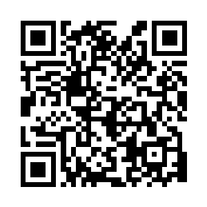 当时的温文杰正在政府大楼同政府官员商议二维码生成