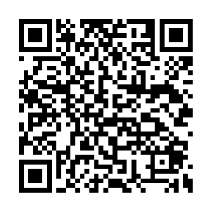 当洪涛终于来到了秀水贸易公司租用的小楼里时二维码生成