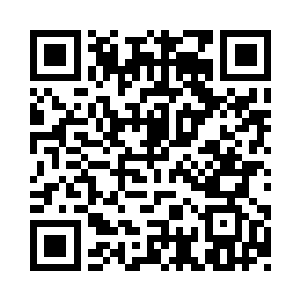 往回走了几步来到一家残疾人用品店二维码生成