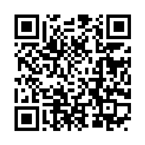 往桌上的那只杯子里面注入了些许茶水二维码生成