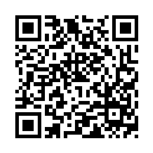 成为震区一片废墟中为数不多的不倒建筑二维码生成