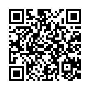 我和老熊坐在仁武堂后院的休息区聊天二维码生成